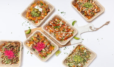six square plates of food with various toppings